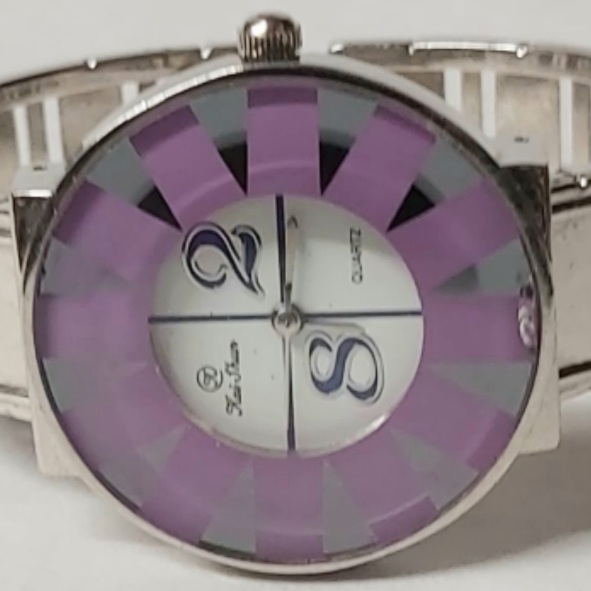 Voir photo 2 de Montre bracelet femme kai shun quartz Montre bracelet femme kai shun quartz Bon état - Vue 2 -